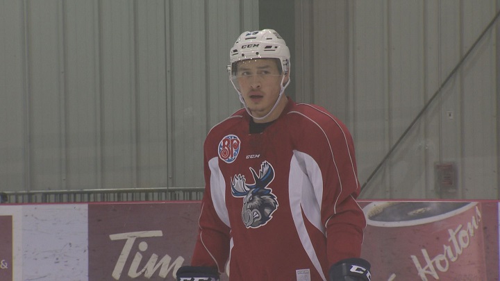 Defenceman Justin Woods practices with the Manitoba Moose.