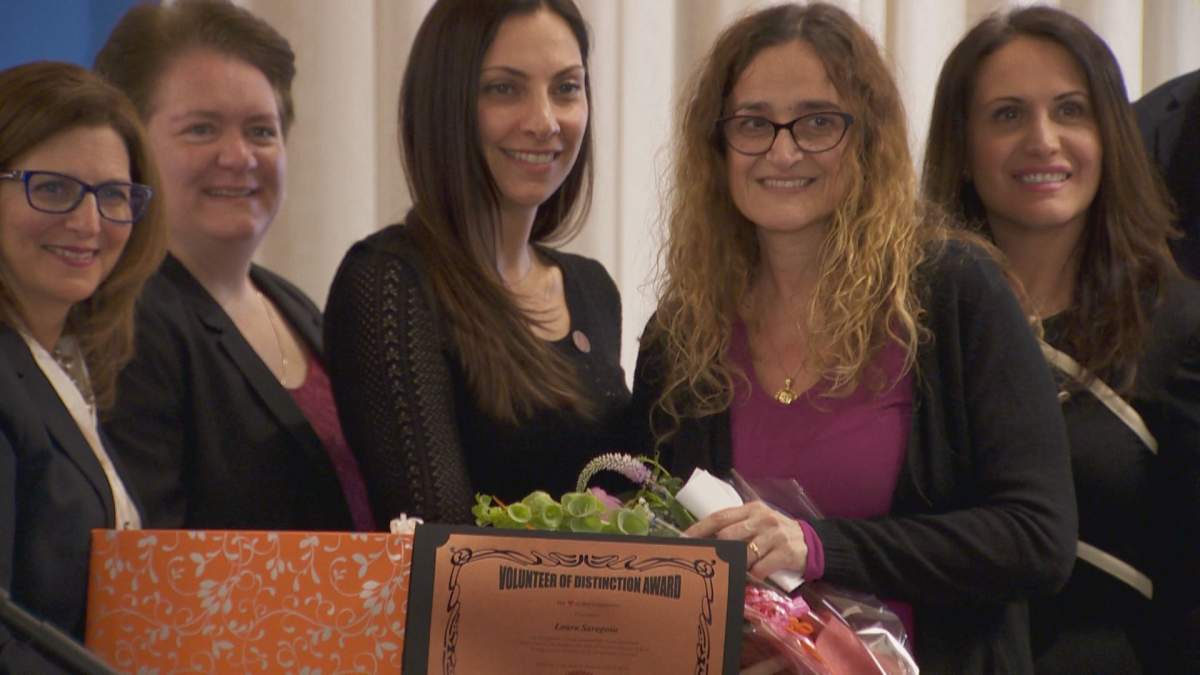 Laura Saragosa (second-to-last) with EMSB officials on Tuesday, April 17, 2018.