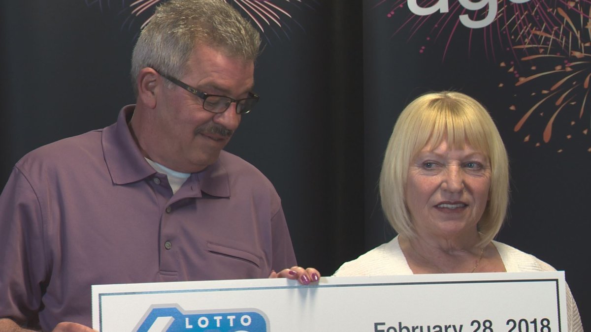 Edward Philpott, left, and Stella Sacrey, right, from Wetaskiwin County at a news conference on Wednesday, April 11, after winning the Wednesday, February 28 $12.5 million LOTTO 6/49 jackpot.