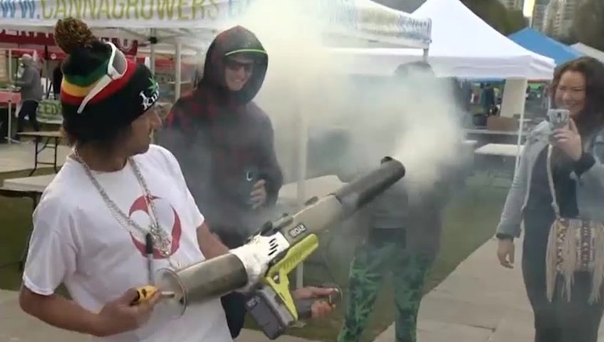 A participant in Vancouver's 2018 4/20 event fires a cannabis-powered "love cannon.".