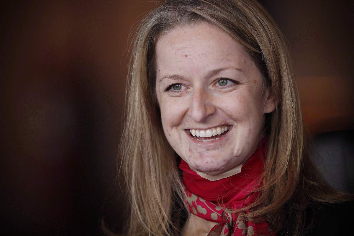 Lawyer Maria Mitousis, who was injured in an office bombing on July 3, speaks to media during a press conference in Winnipeg, Wednesday, September 30, 2015. Court has heard a lawyer badly injured when a letter bomb went off at a Winnipeg law firm was covered in blood and holding her abdomen when she walked out of her office. 