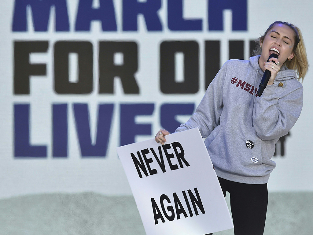 Miley Cyrus sings during the March for Our Lives Rally in Washington, DC on March 24, 2018. 