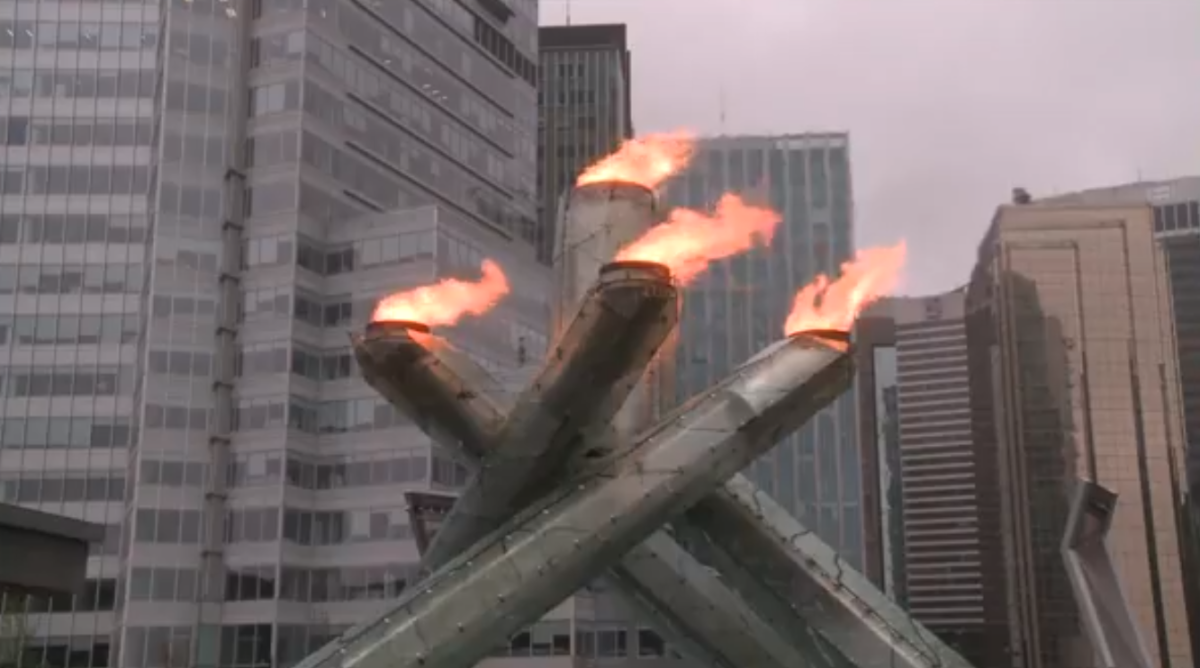 The Olympic Cauldron at Jack Poole Plaza was lit on Saturday to honour workers injured or killed on the job. 
