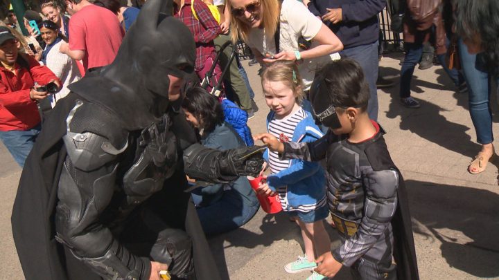 File: Thousands of people marched in the 2018 'Pow! Parade of Wonders' to kick off the Calgary Expo.