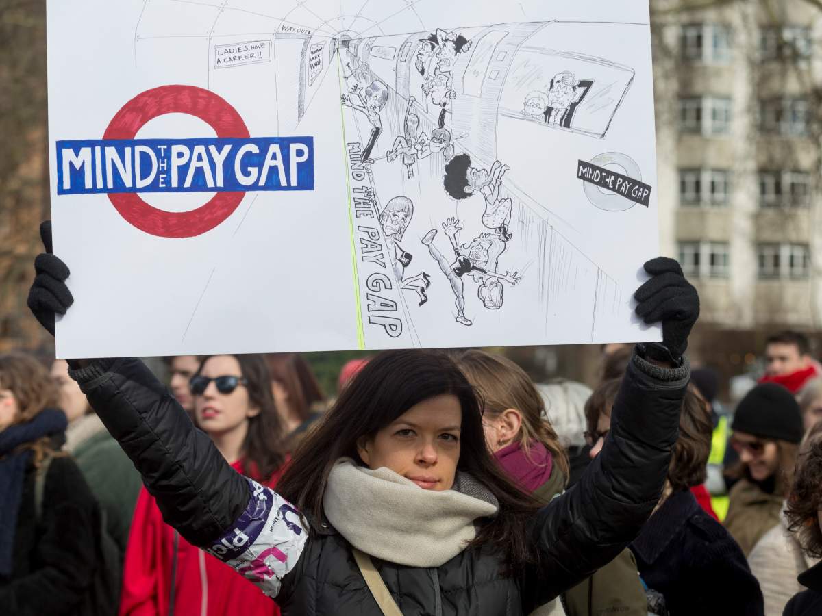 Women in London celebrate International Women's Day, March 8, 2018.