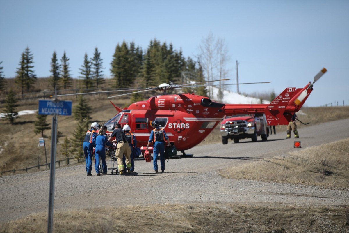 A STARS Air Ambulance on the scene of an emergency call involving a child in Priddis, Alta., on Thursday, April 26.