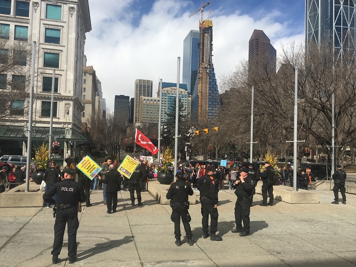 There was a large police presence at Calgary's Municipal Building due to competing rallies.