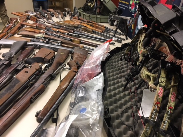 29 firearms and a crossbow were among the items seized during two search warrants conducted in Red Deer, Alta. on Monday, Dec. 11, 2017.