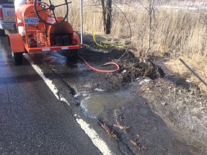 Part of de la Baie Road in Rigaud is closed due to a road collapse following heavy rain.