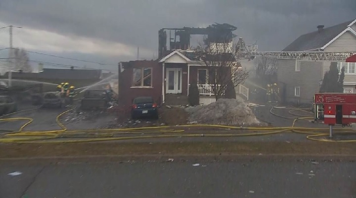 One person was injured after a fire tore through a residential building in Saint-Pie, Sunday, March 31, 2018.