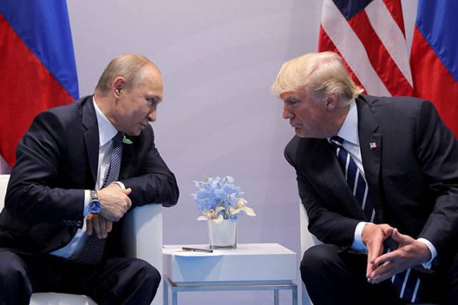 Russia's President Vladimir Putin talks to U.S. President Donald Trump during their bilateral meeting at the G20 summit in Hamburg, Germany, July 7, 2017.  