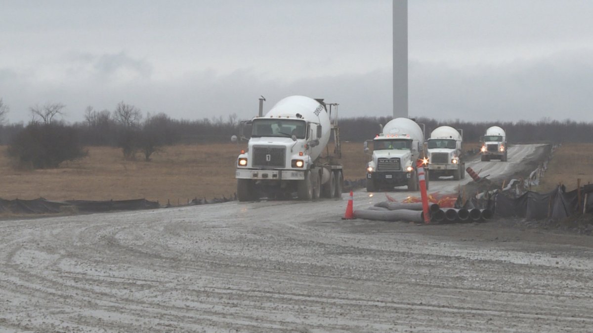 Trucks leaving a wind turbine construction site on Amherst Island. 