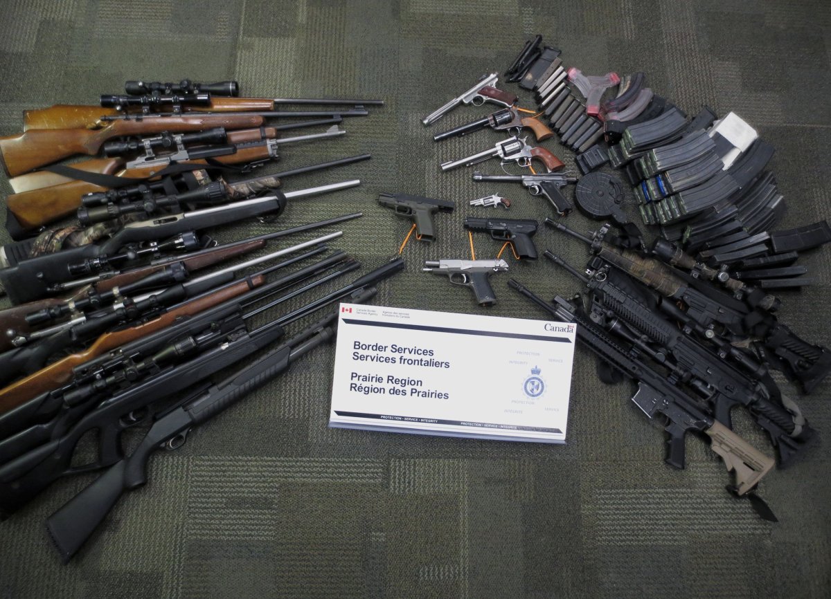 Two people were charged after 24 undeclared guns were seized at an Alberta border crossing, April 17, 2018. 