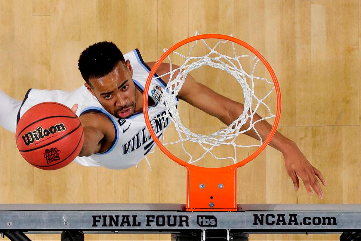 Villanova guard Phil Booth drives to the basket during the first half against Michigan in the championship game of the Final Four NCAA college basketball tournament, Monday, April 2, 2018, in San Antonio.