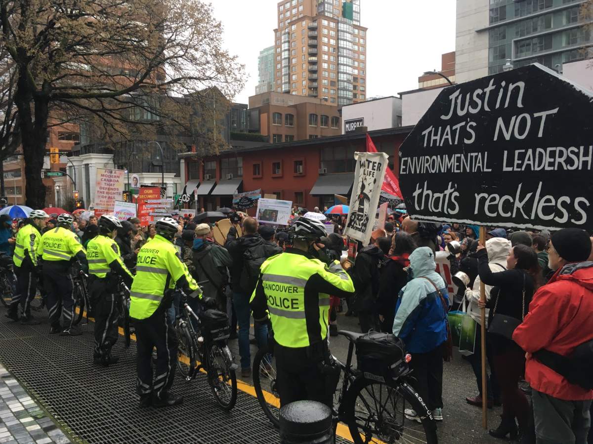 The scene outside the Sheraton Wall Centre in Vancouver as protesters demonstrated against Prime Minister Justin Trudeau and his decision to allow the expansion of Kinder Morgan's Trans Mountain pipeline on April 5, 2018.