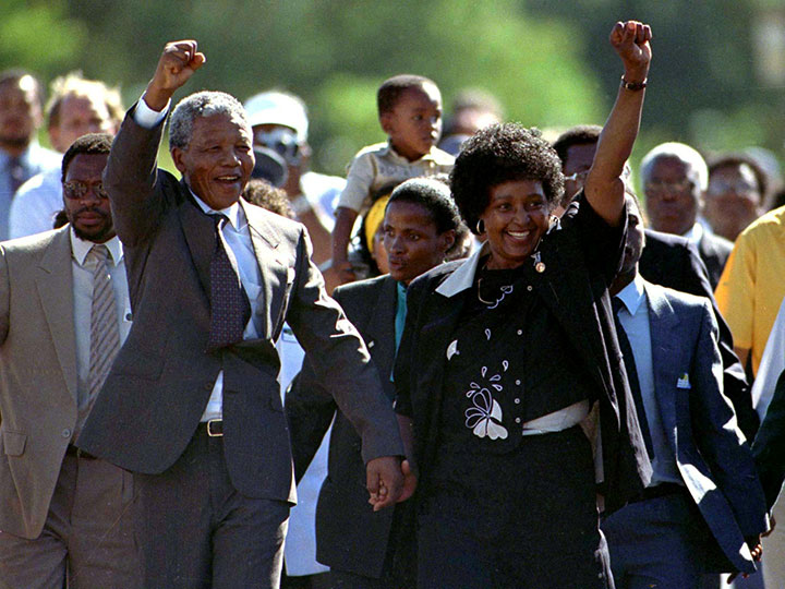 Nelson Mandela is accompanied by his then-wife Winnie moments after his release from prison near Paarl, South Africa, Feb. 11, 1990.