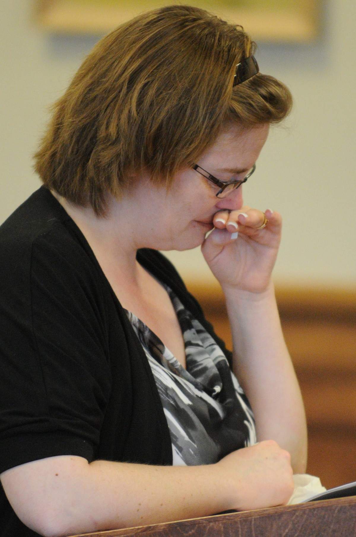 Carmen Blackburn, the daughter of convicted murderer Ronald Smith, breaks down while giving testimony in the clemency hearing for father In Powell County District Court, Wednesday, May 2, 2012 in Deer Lodge, Mont.