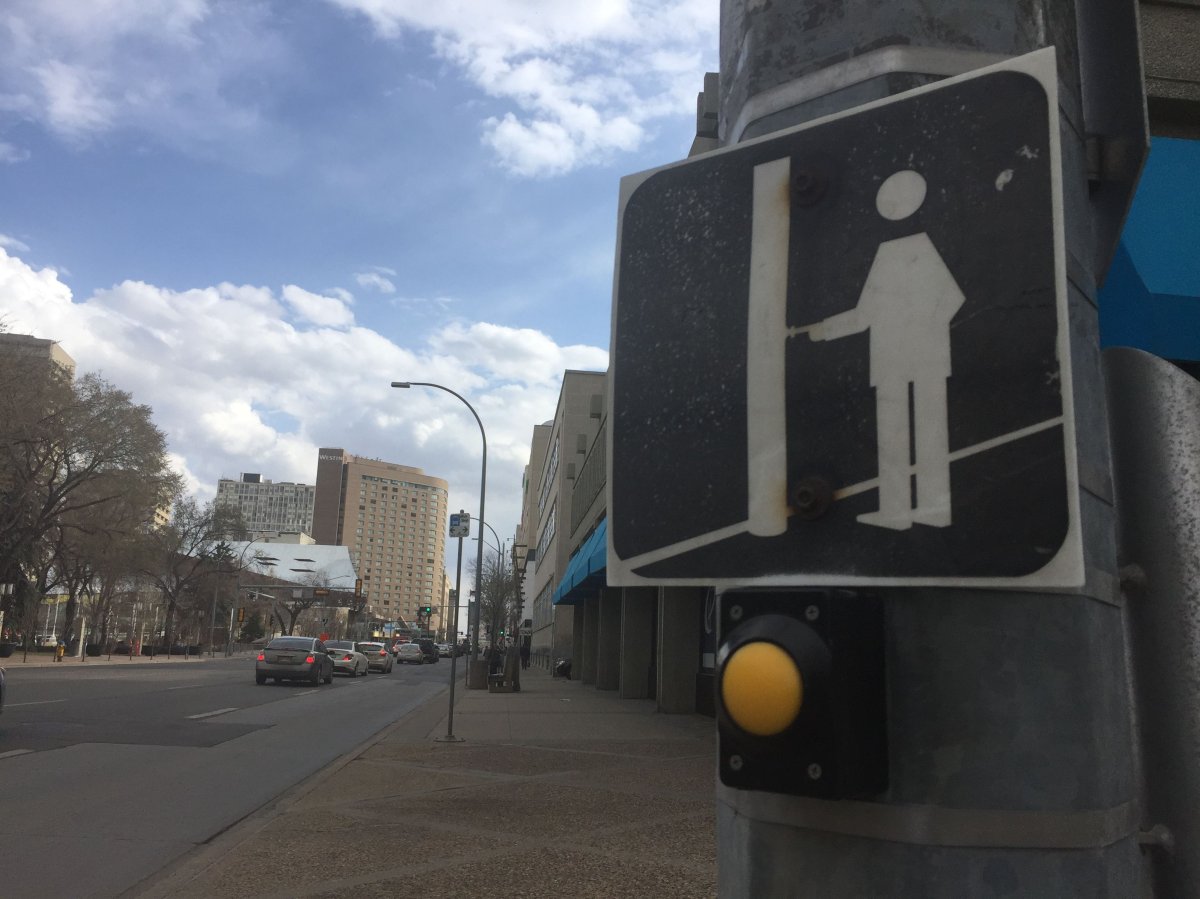 Pedestrian crosswalk button in Edmonton, May 2, 2018.