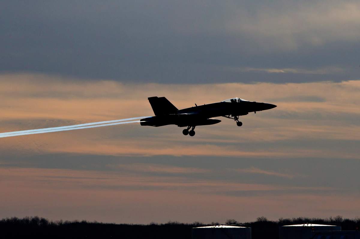 A CF-18 Hornet in Cold Lake, Alberta on Tuesday October 21, 2014. The Canadian fighter aircraft were making their way to Kuwait to join the fight against ISIS. THE CANADIAN PRESS/Jason Franson