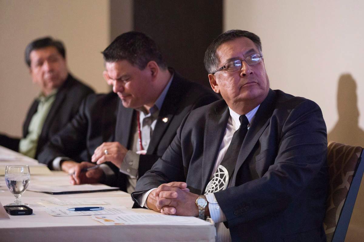 Chief Clifford Bull (right) appears in a 2016 file photo. He is running in Ontario's provincial election under the PC banner.
