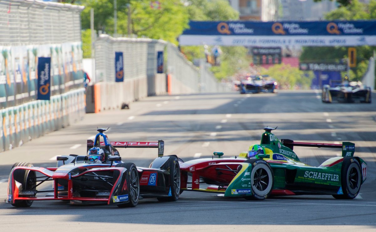 Drivers take a turn during the Montreal Formula ePrix electric car race, in Montreal on Sunday, July 30, 2017. 