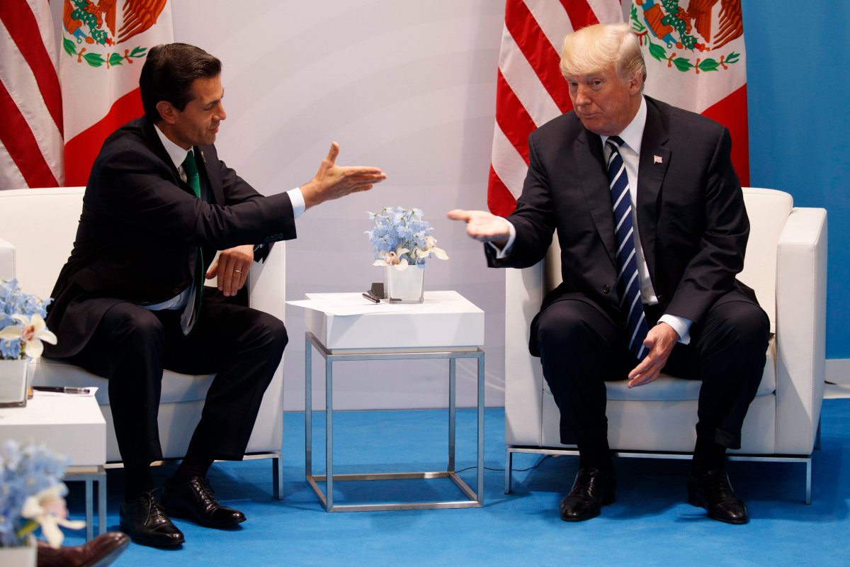 FILE - In this July 7, 2017 file photo, U.S. President Donald Trump meets with Mexican President Enrique Pena Nieto at the G20 Summit, in Hamburg. 