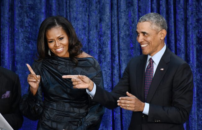 Former President Barack Obama and First Lady Michelle Obama attend the unveiling of their official portraits at the National Portrait Gallery, Feb. 12, 2018 in Washington, DC. 