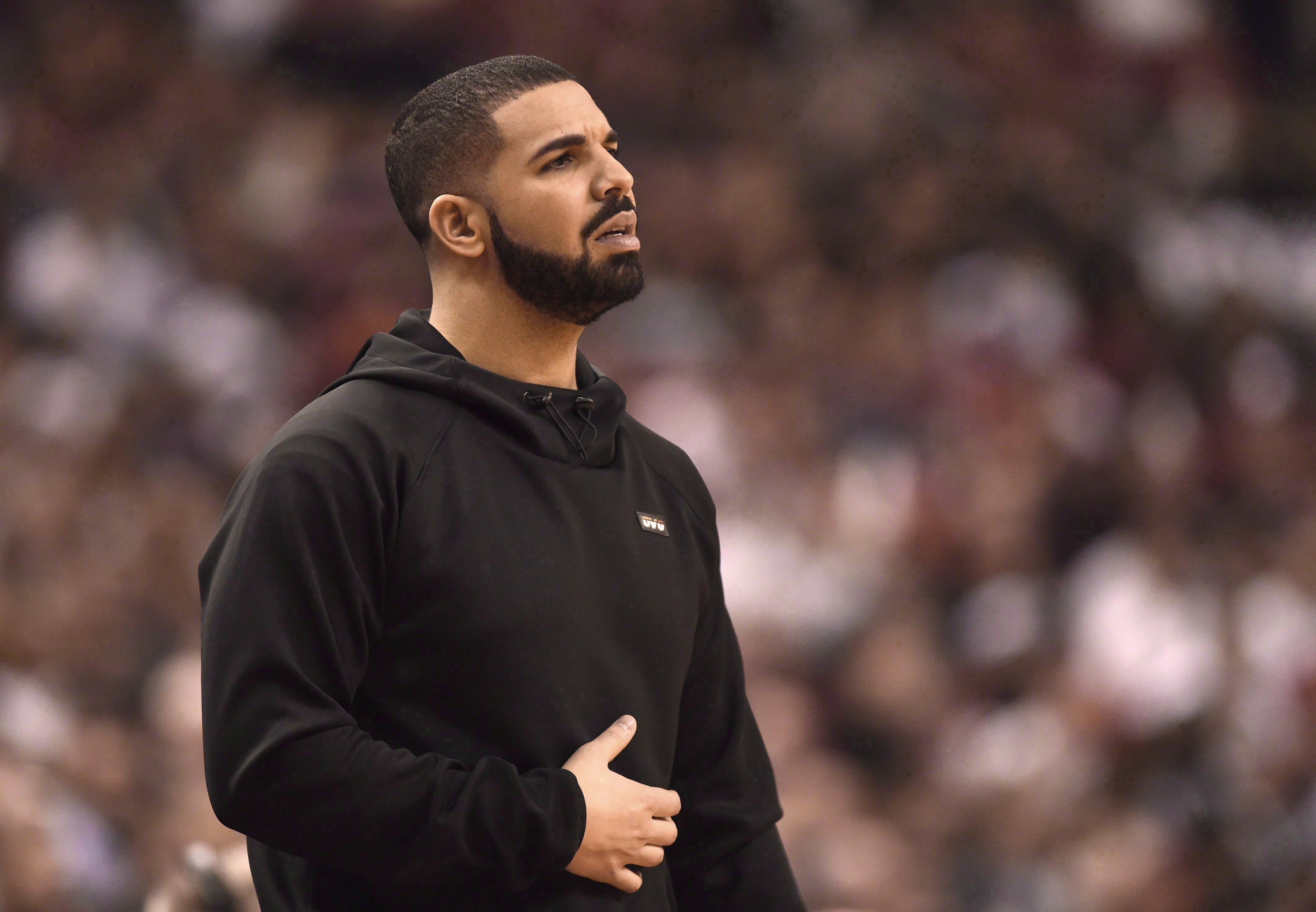 Drake left steaming after words with Cavaliers centre Kendrick Perkins in  playoff loss