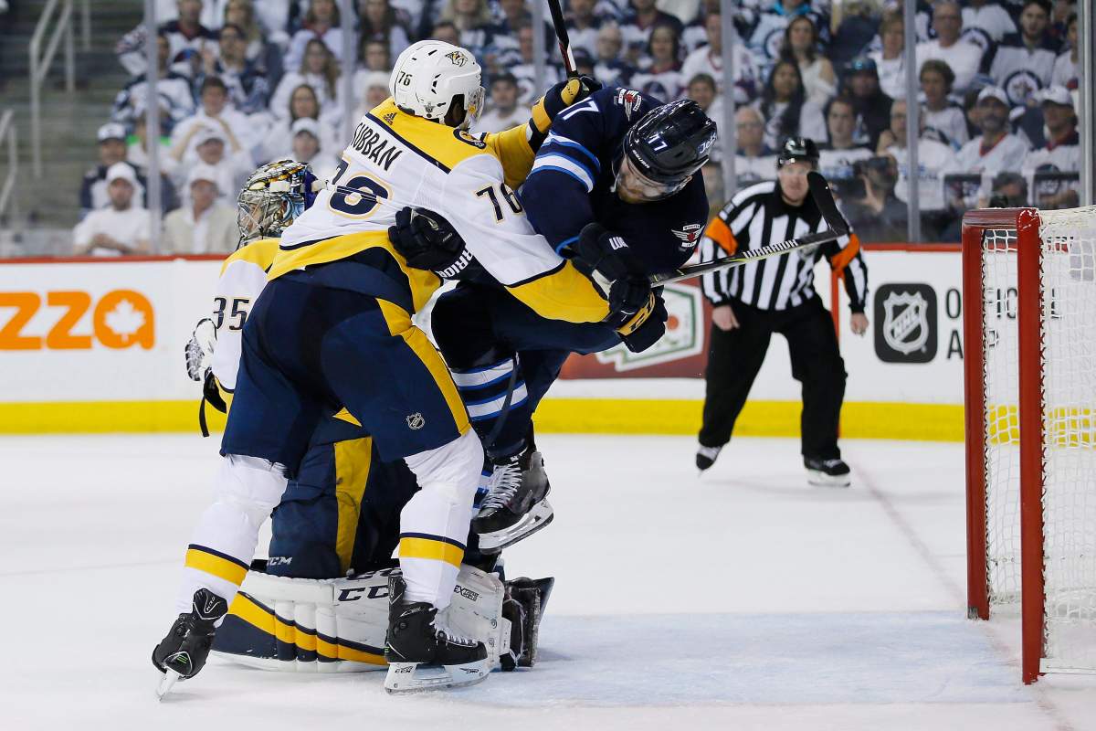 Nashville Predators' P.K. Subban (76) man handles Winnipeg Jets' Adam Lowry (17)Êduring second period NHL round-two game four playoff action in Winnipeg on Thursday, May 3, 2018. THE CANADIAN PRESS/John Woods.