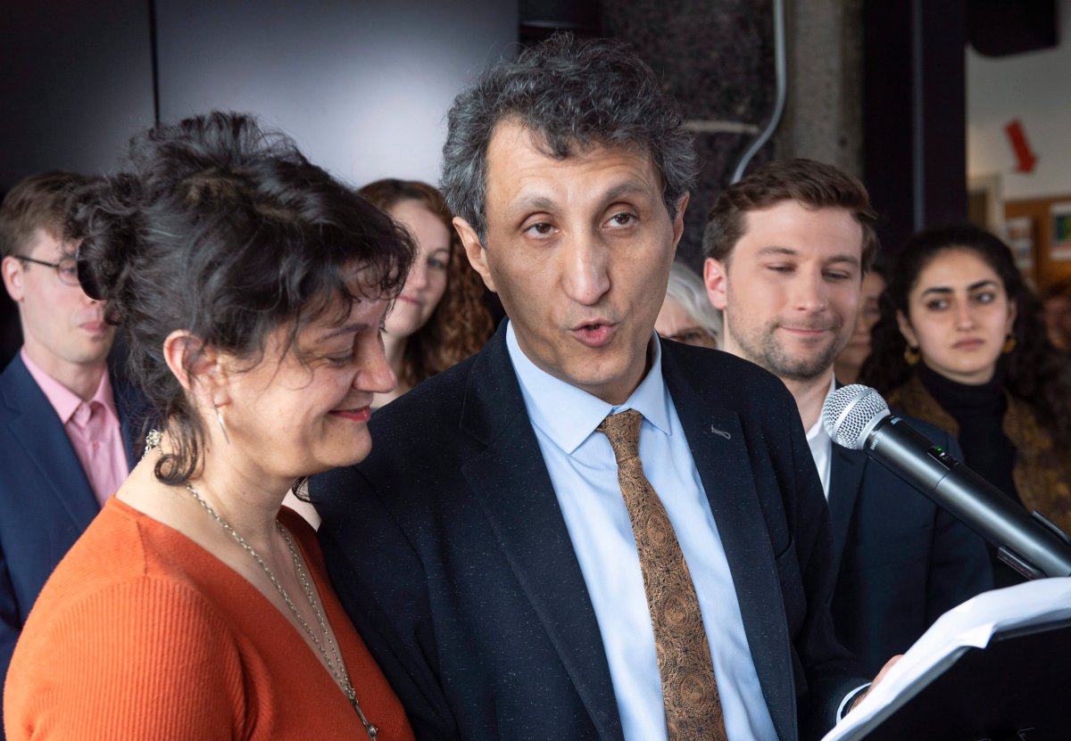 Québec Solidaire MNA Amir Khadir announces he will not run in the next provincial elections flanked by his wife Nima Machouf, left, fellow MNA Gabriel Nadeau-Dubois and his daughter Yalda, right, during a news conference Friday, May 4, 2018 in Montreal. 