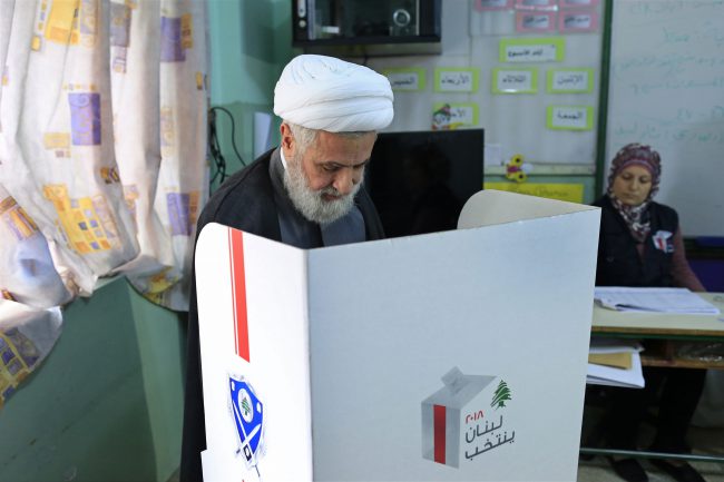 The deputy chief of Hezbollah, Sheik Naim Kassem, marks his ballot during Lebanon’s parliamentary elections in Beirut, Lebano