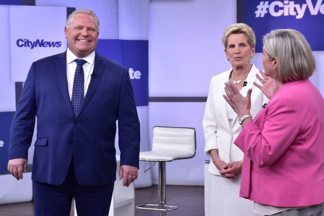 Liberal Premier Kathleen Wynne, centre, Progressive Conservative Leader Doug Ford, left, and NDP Leader Andrea Horwath take part in the Ontario Leaders debate in Toronto on Monday, May 7, 2018. This is the first of three debates scheduled before the June 7 vote.