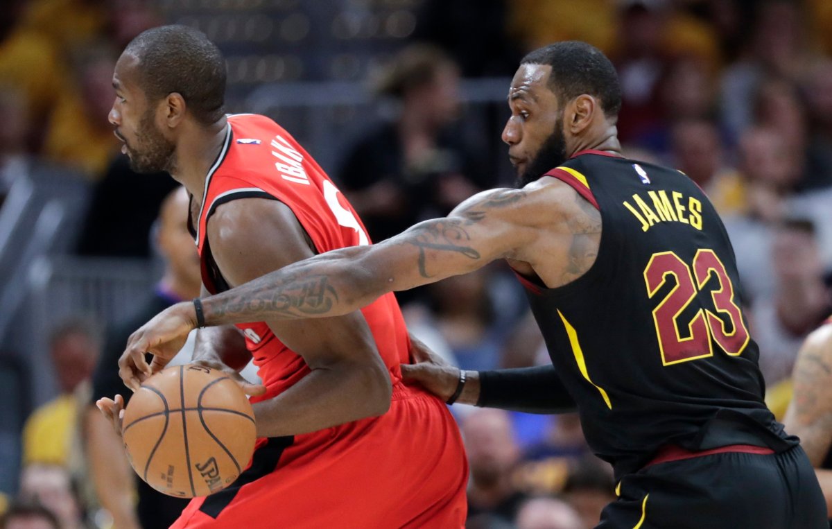 Cleveland Cavaliers' LeBron James (23) strips the ball from Toronto Raptors' Serge Ibaka in the first half of Game 4 of an NBA basketball second-round playoff series, Monday, May 7, 2018, in Cleveland.