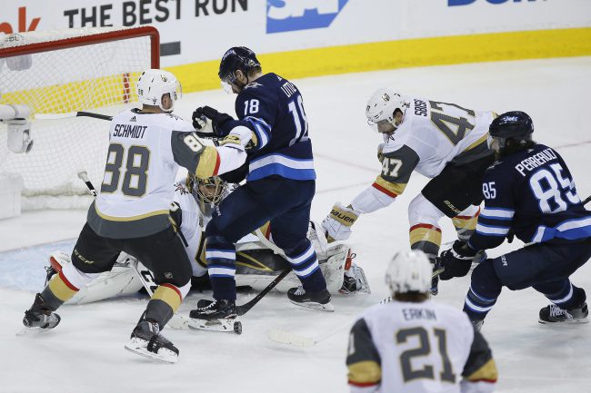 In this photo from the NHL Western Conference Final in Winnipeg on Saturday, May 12, 2018, current Jet Nate Schmidt (88) can be seen as a member of the Golden Knights, while Winnipeg-born Cody Eakin (21) looks on. Eakin and Luca Sbisa (47) both spent time as members of both teams.