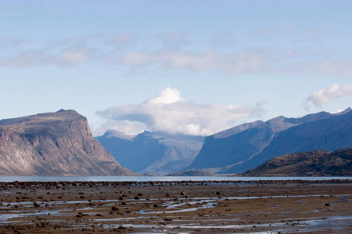 The view towards Cumberland Sound from the hamlet of Pangnirtung, Nunavut Thursday August 20, 2009. Everyone thought things in this Nunavut community were finally been looking up. Pangnirtung, which once had one of the highest suicide rates in the territory, hadn’t seen such a tragedy in over a year. A local community group had drawn up a forward-looking, proactive plan to keep its youth safe. People breathed easier. Then came February.