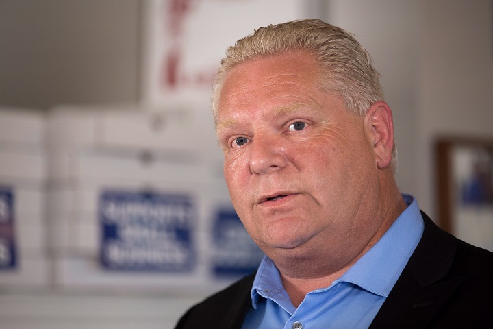 Ontario PC leader Doug Ford makes an announcement at Capri Pizza during a campaign stop in Cambridge, Ont., on Thursday.