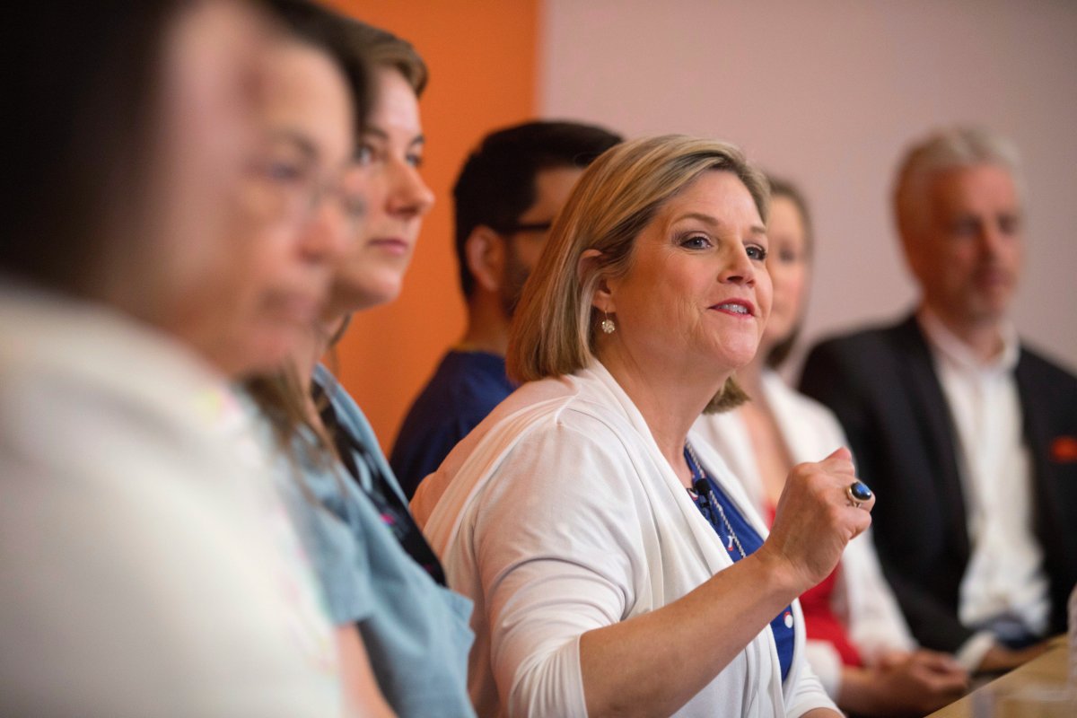 Ontario NDP Leader Andrea Horwath attends a discussion with health care professionals during a campaign stop in Toronto on Thursday, May 24, 2018. 
