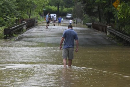 Video shows flash flood sweeping through Baltimore-area street after ...