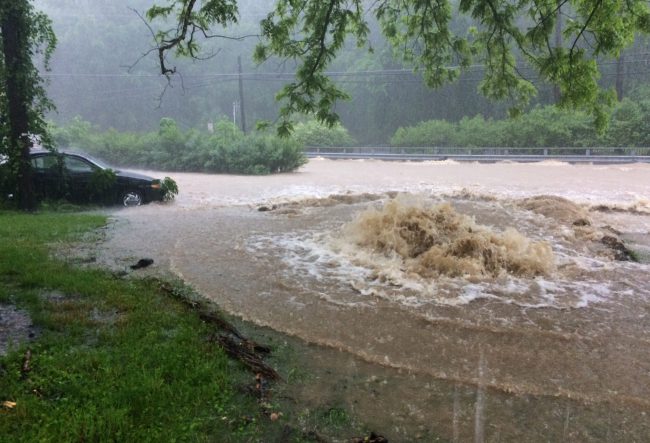 Video shows flash flood sweeping through Baltimore-area street after ...