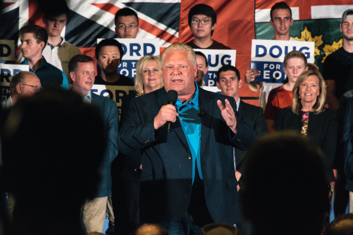 Ontario PC Leader Doug Ford addresses a rally at the London Convention Centre on York Street. Behind him, from left to right, is Elgin-Middlesex-London PC candidate Jeff Yurek, London North Centre candidate Susan Truppe, London-Fanshawe candidate Eric Weniger and Newmarket-Aurora candidate Christine Elliott.
