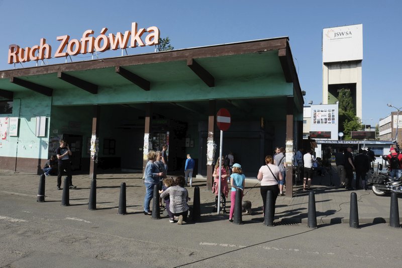 NoneFamilies waiting for a word about miners who have gone missing after a tremor at the Zofiowka coal mine in Jastrzebie-Zdroj in southern Poland, on Saturday, May 5 , 2018. Seven miners went missing after the strongest ever tremor at the mine. Two of them were found hours later conscious but hurt, while rescuers continued their search for the other five missing miners.