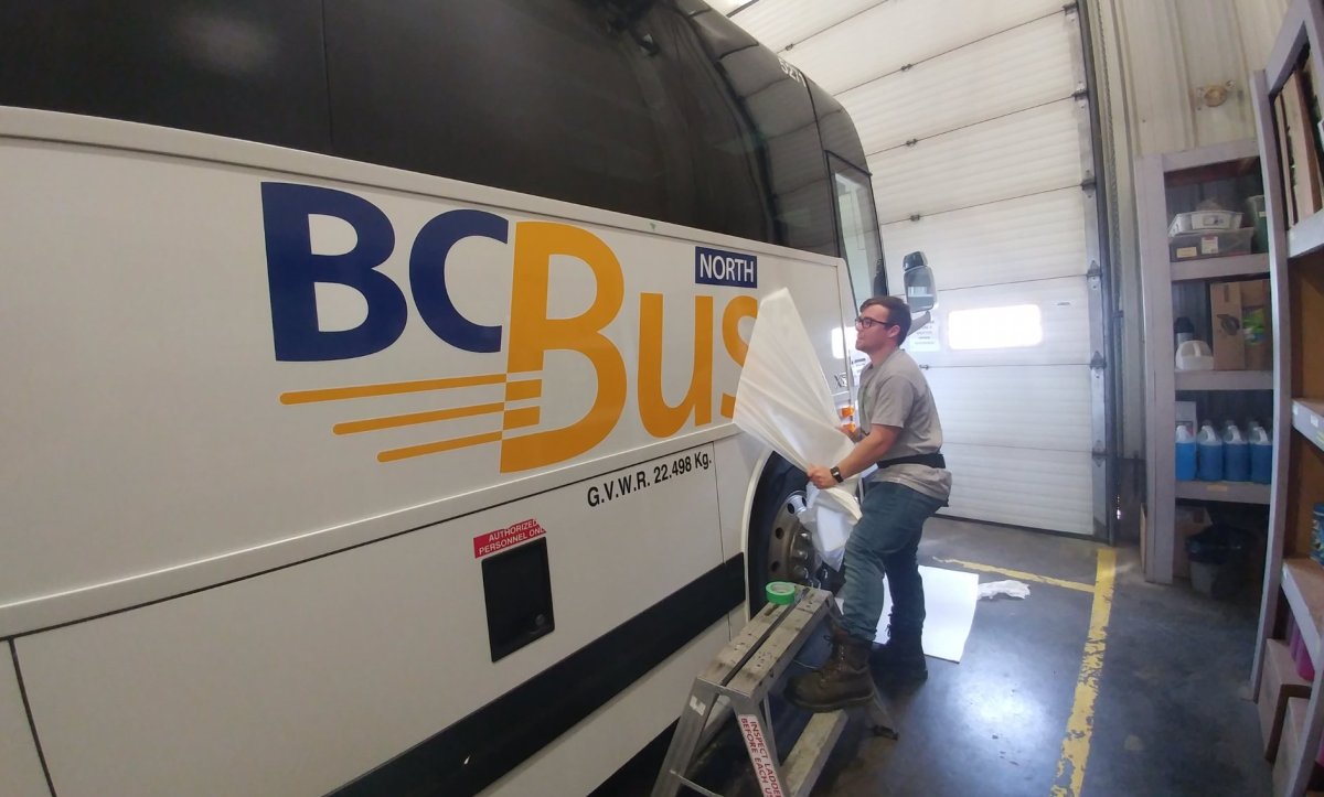A BC Bus North charter bus is unveiled in May 2018. The service, which was launched by the province days after Greyhound announced it was pulling out of most routes in western Canada, has been extended thanks to a cost-sharing deal with the federal government.