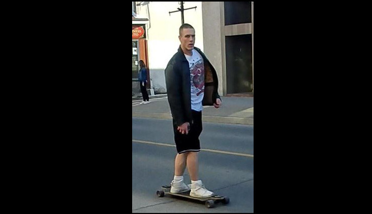 A skateboarder from Newmarket is facing an assault charge after he allegedly spat on an 81-year-old man.