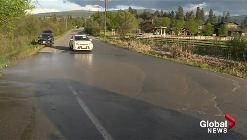 Signs warning drivers of water on the road have been placed at Casorso Road near Swamp Road in Kelowna. Mission Creek has begun flooding the forest north of Casorso and the water has now reached the road.