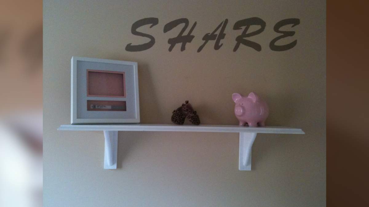 The leopard print shoes Mallory and Dave bought for Charlee when they found out they were having a girl.