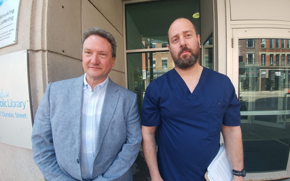 Co-chairs of London Health Coalition Peter Bergmanis and Jeff Hanks at a press conference on May 23, 2018, discussing the health-care debate and Susan Truppe's refusal to attend. 