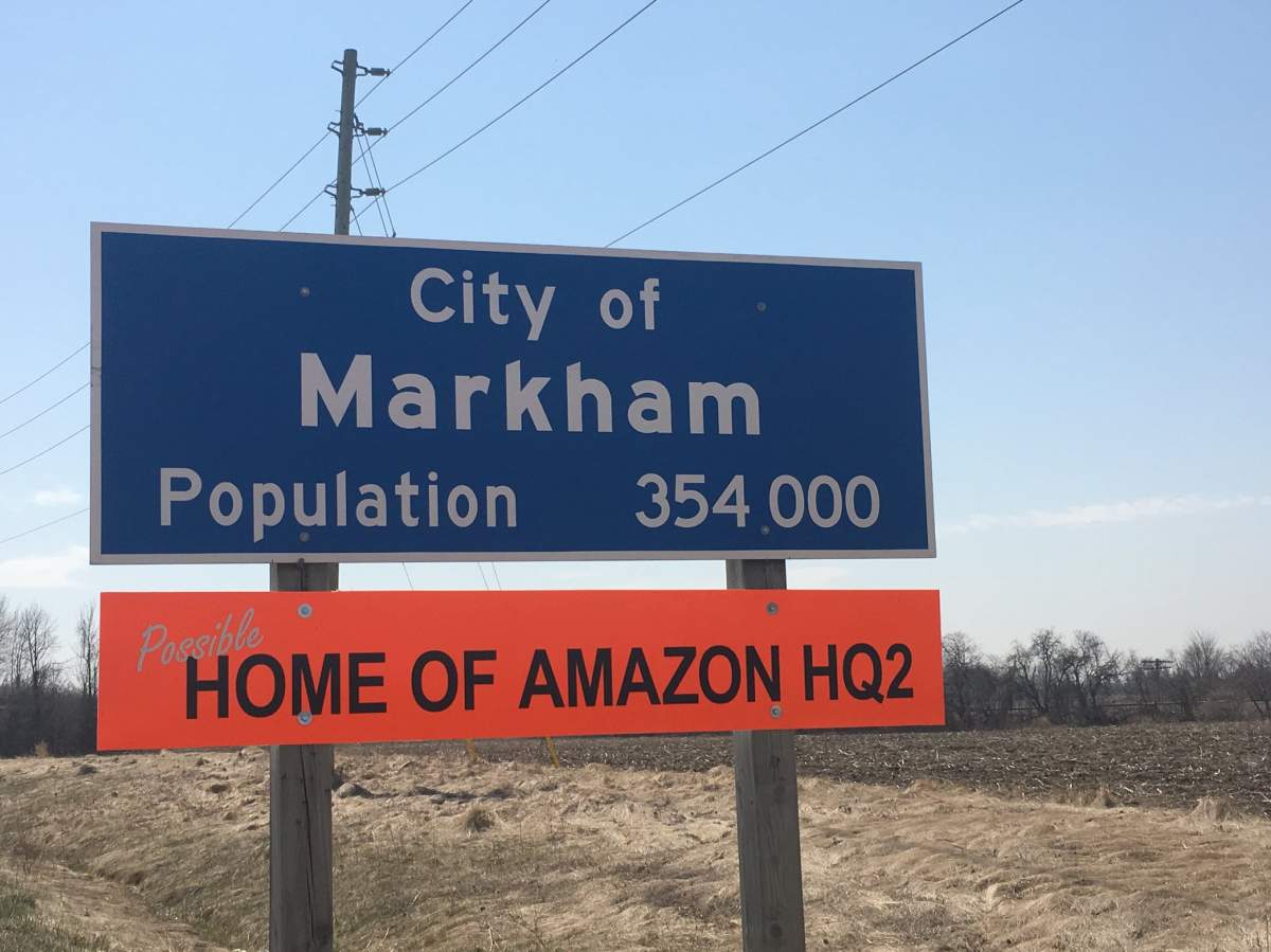 An orange sign that says, "Possible home to Amazone HQ2", appears in Markham, Ont., on May 7, 2018.