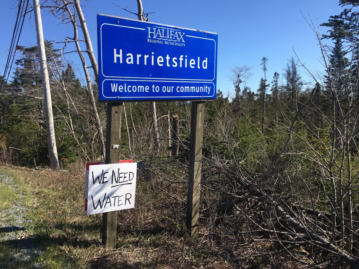 Homemade signs line the road to Harrietsfield, N.S.,  on May 14, 2018.