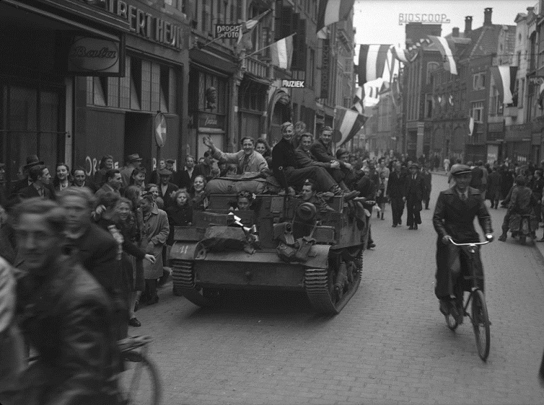 Dutch civilians celebrate the liberation of Zwolle, Netherlands on April 14, 1945.