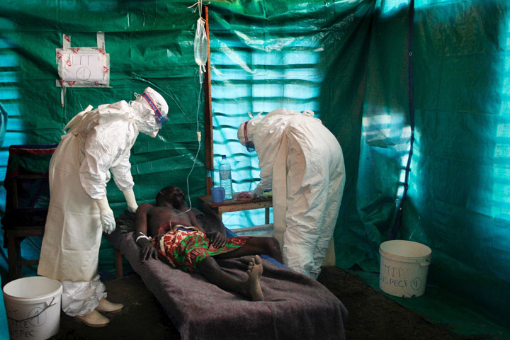 File photo - Medical staff of Medecins Sans Frontieres (MSF) (Doctors without Borders) treat a patient suspected to be suffering from Ebola Hemorrhagic Fever in the isolation unit of Kampungu,Congo ii early September 2007.